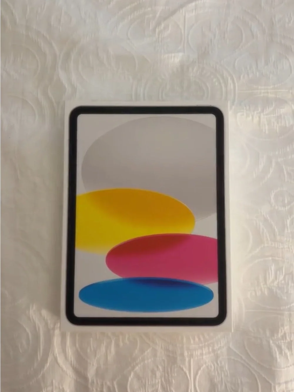 Apple Silver Tablet with Rear Camera and Apple Logo